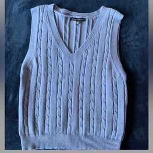 Faded blue sweater vest